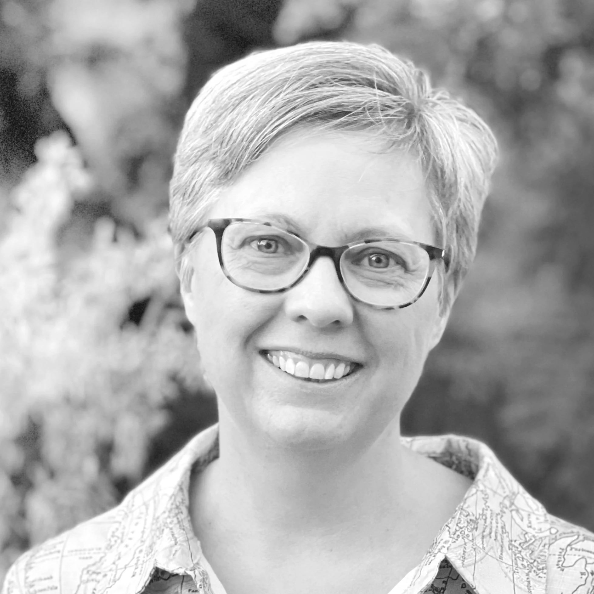 Andrea Allen Sis, Partner Architect at EcoNest Architecture, black-and-white portrait