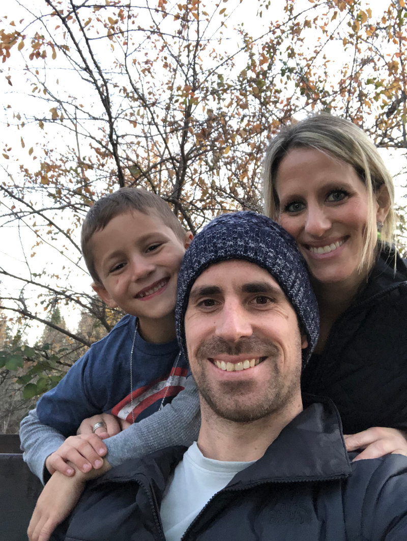 Bry Austin with husband and son — autumn family portrait